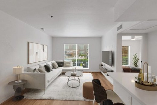 Renovated apartment interior with new flooring and finishes